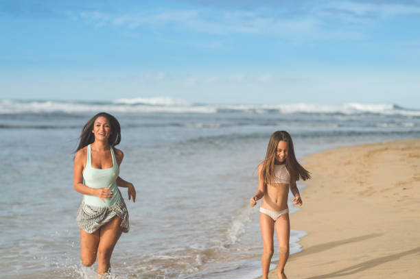 istock Hawaii family vacation on beach 838989352