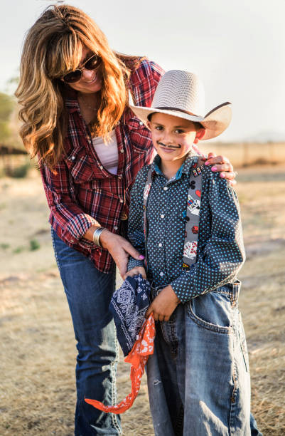 お母さんと息子でロデオ - rodeo clown ストックフォトと画像