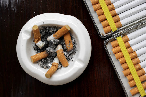 istock smoked cigarettes in white ashtray 838999096