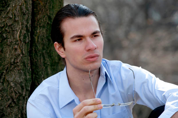 istock Man sitting outdoors 839014388