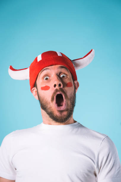 istock The football fan over blue 839014684