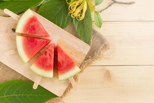 istock watermelon slices close-up on a brown wooden table 839015010