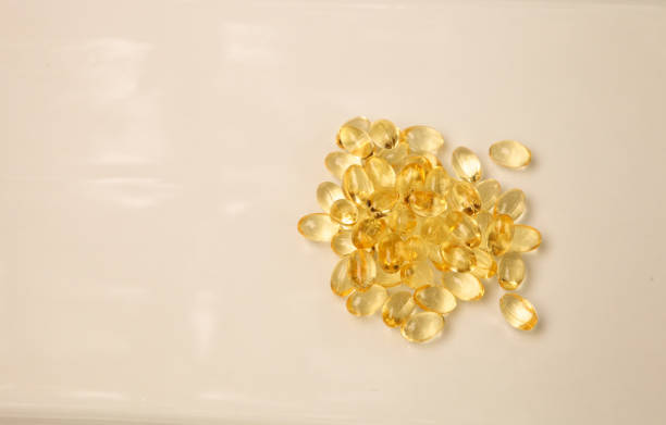 istock Liquid gold gel capsule of vitamin D 839017876