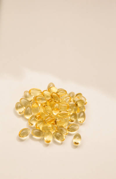 istock Liquid gold gel capsule of vitamin D 839017916