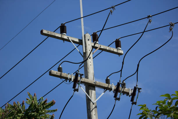 istock Closeup Eletricity line in blue sky 839024888