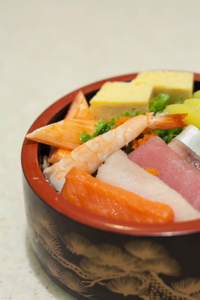 istock Japanese Rice with sashimi on top 839025058