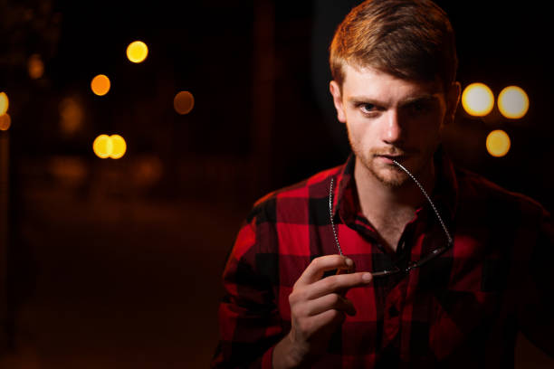 istock Night portrait of hipster man 839025148