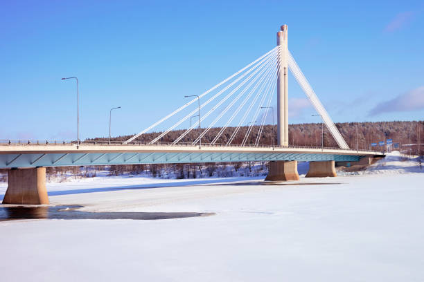 istock Candle bridge with blue sky in snow covered Rovaniemi 839025706