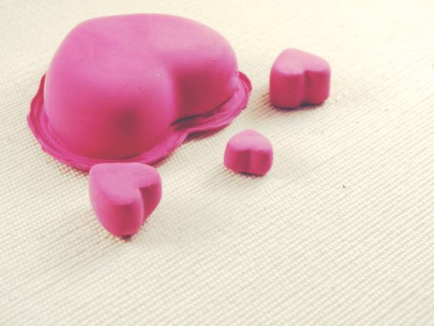 istock valentine love pink hearts close up top view with copy space 839030390