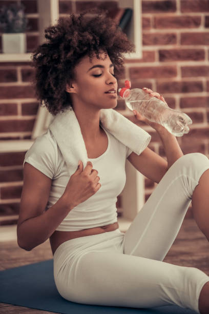 istock Afro American girl doing yoga 839034322