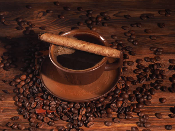 istock Coffee cup on a wooden backgound. 839034390