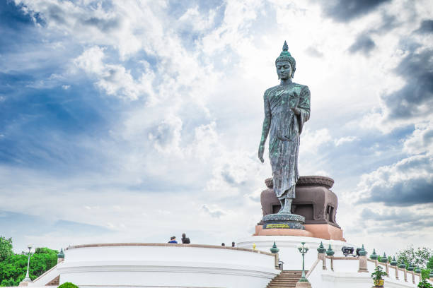 istock Walking Buddha statue style in Thailand 839034692