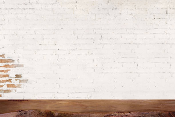 istock Mock up wooden table with white brick wall. For product display montage. 839036876