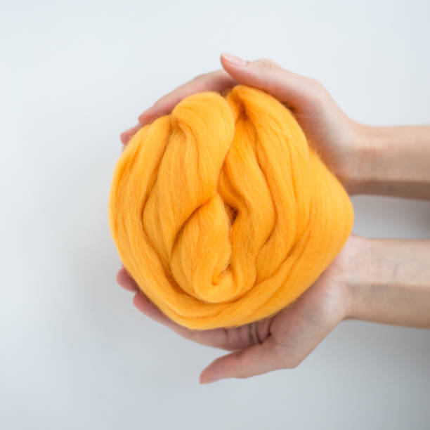 istock Close-up of  merino wool ball in hands. 839039974