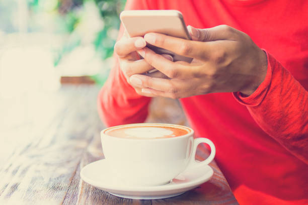 istock Close-up of unrecognizable woman using smartphone 839040084