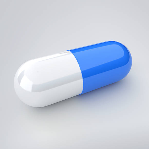 istock pills or capsules isolated on grey background 3D rendering 839045042