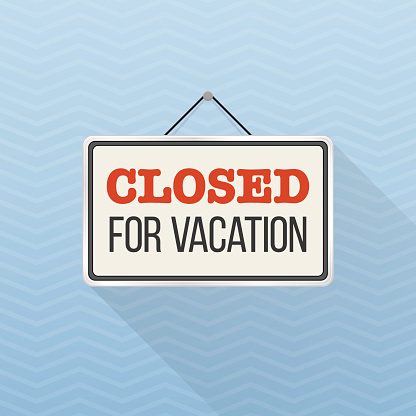Simple white sign with text 'Closed for vacation' hanging on a blue office wall. Creative business interior template for shop, store, supermarket. Rectangular layout for holiday season