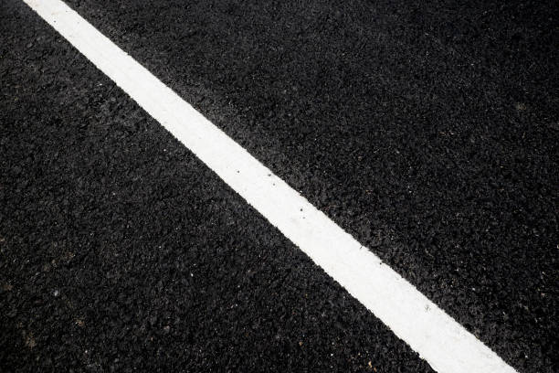 istock new white line on the road texture 839045618