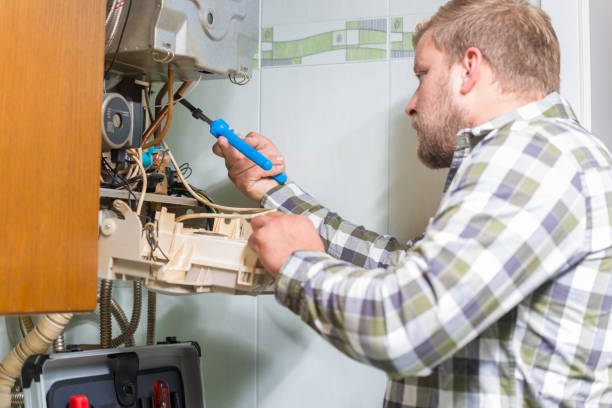 technicien réparation gaz fourneau - plumber boiler technician natural gas photos et images de collection