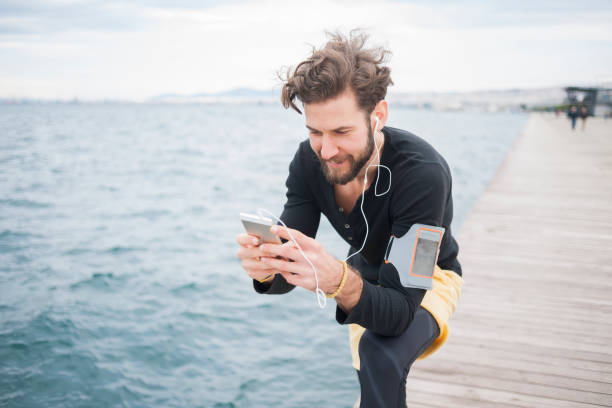 istock Man jogging near sea 839064852