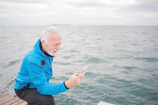 istock Man jogging near sea 839066000