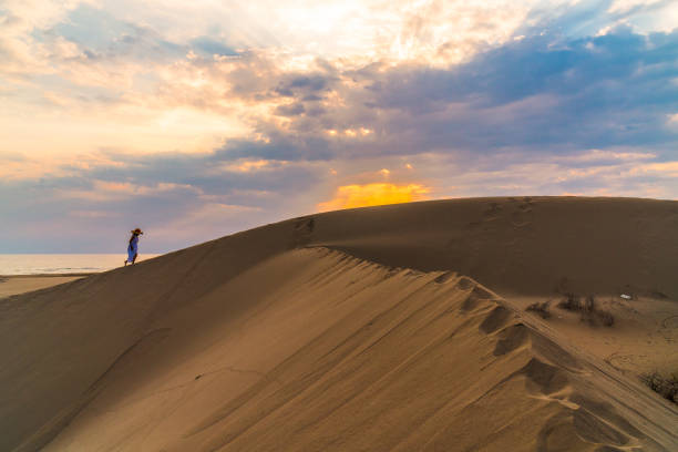 istock Woman walking in the desert. Patara. 839073676