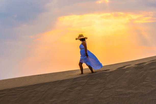istock Woman walking in the desert. Patara. 839074292