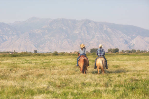 istock Young couple enjoying horseback riding together 839081260