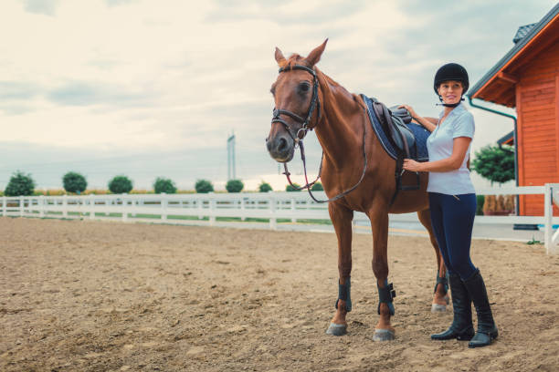 istock Female rider with her horse 839090788