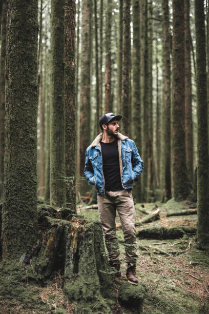 istock solitude traveler walking into the wood 839097226