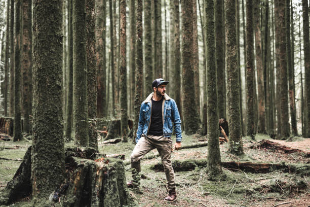 istock solitude traveler walking into the wood 839098238