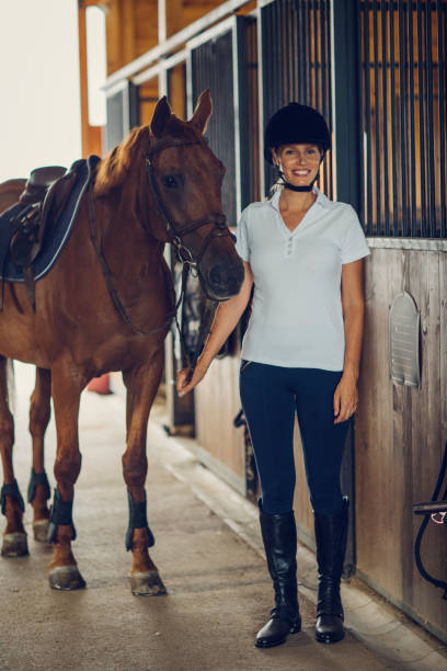 istock Female rider with her horse 839105300
