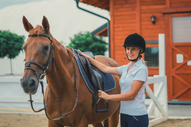 istock Female rider with her horse 839106278