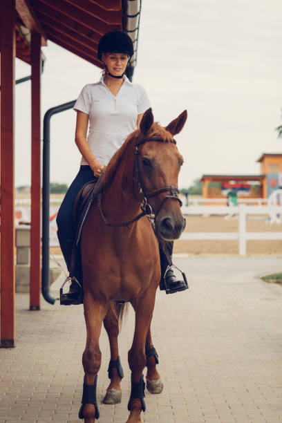 istock Female rider with her horse 839106384