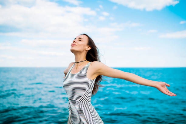 istock Free woman relax on the sea 839113528
