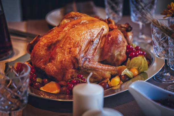 istock Family Having Traditional Holiday Stuffed Turkey Dinner 839113954