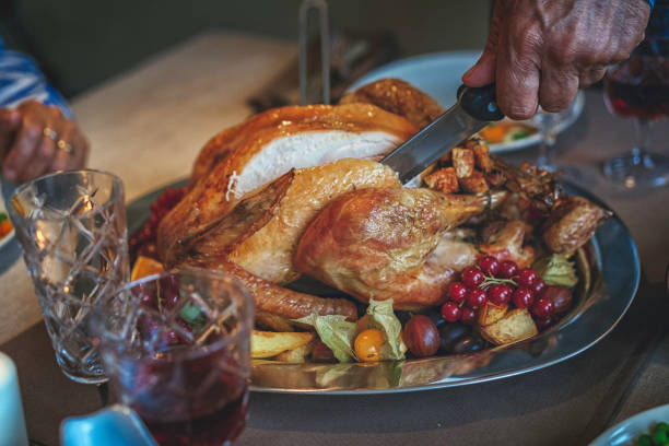 istock Family Having Traditional Holiday Stuffed Turkey Dinner 839113996