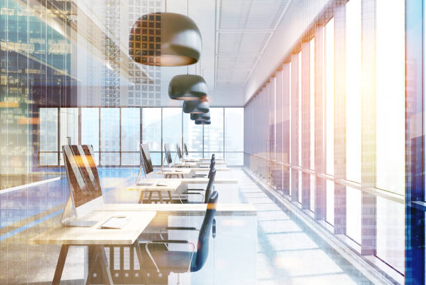 istock Blue office with black round lamps, tables toned 839126430