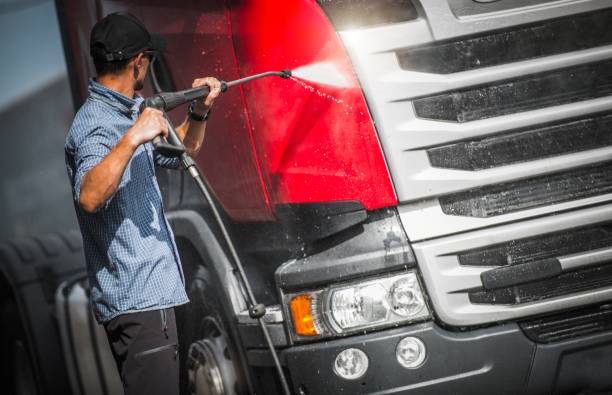 istock Truck Driver Washing His Semi 839169520