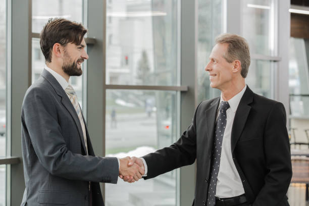 istock Stylish businessmen working in office 839170526