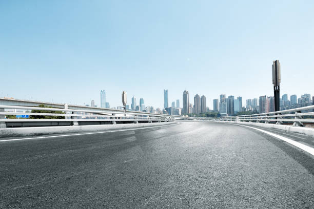 istock empty road and cityscape of modern city 839174272