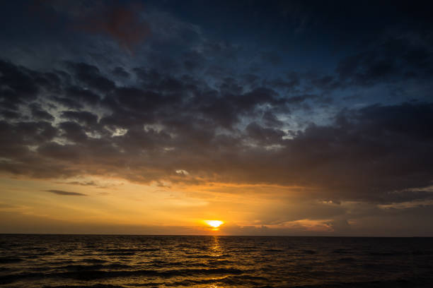 istock Magic sunset view seascape with beautiful colorful sky, sun and clouds 839174820