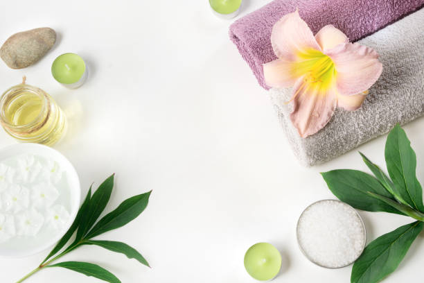 istock Spa setting of towel, flower isolated on white background with copy space. 839187710