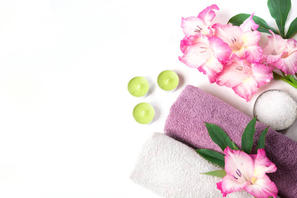 istock Spa setting of towel, flower isolated on white background with copy space. 839187712