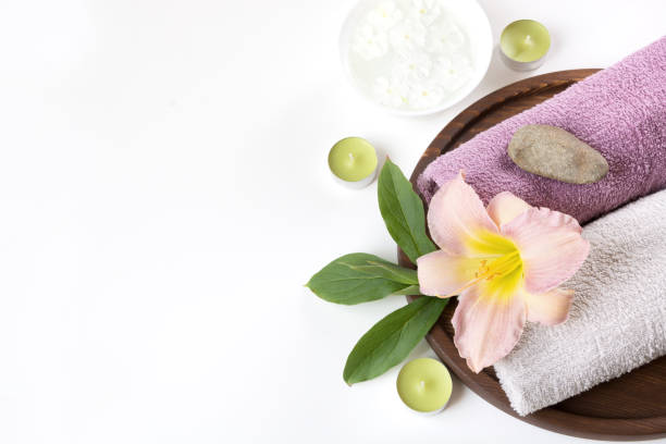 istock Spa setting of towel, flower isolated on white background with copy space. 839192972