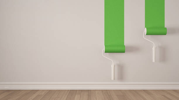 istock Empty room with paint rollers and painted wall, wooden floor, white and green minimalist interior design 839194962