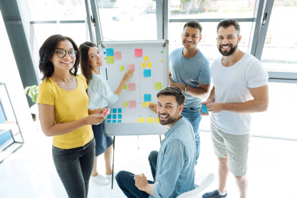 istock Team of creative positive people looking at you 839199676