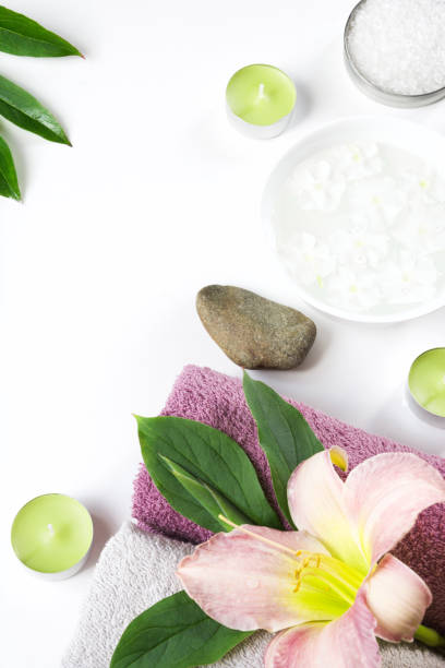 istock Spa setting of towel, flower isolated on white background with copy space. 839205252