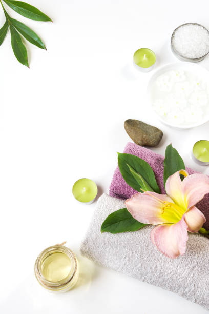 istock Spa setting of towel, flower isolated on white background with copy space. 839205264