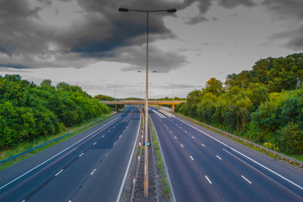 istock Landscape road in mountains under cloudy sky 839207464